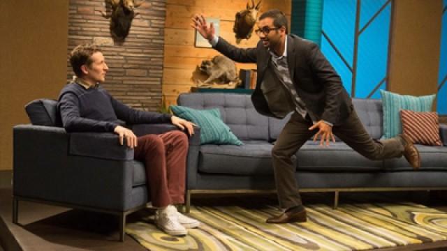 Aziz Ansari Wears A Charcoal Blazer