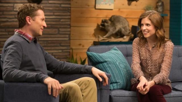 Anna Kendrick Wears A Patterned Blouse & Burgundy Pants