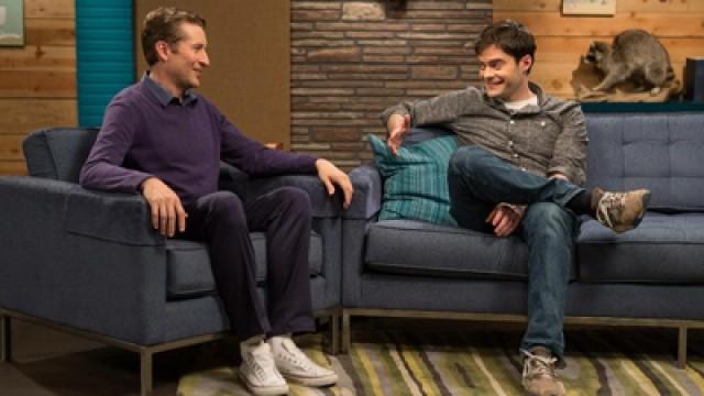 Bill Hader Wears A Grey Button Down Shirt & Sneakers