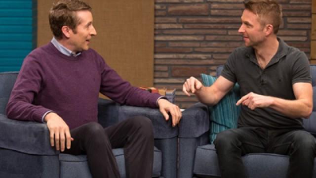 Chris Hardwick Wears a Black Polo & Weathered Boots