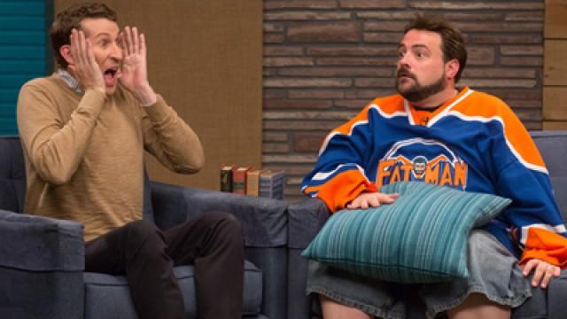 Kevin Smith Wears a Hockey Jersey & Jean Shorts