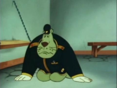 El señor comisario entra en el calabozo