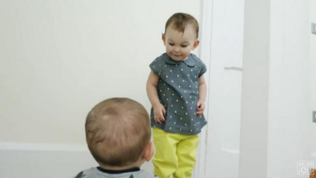 STANDING IN THE CRIB!