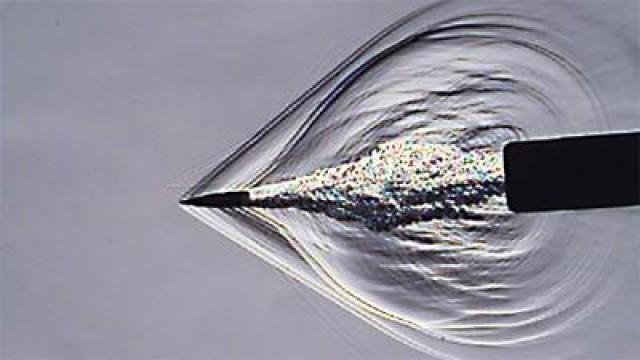 Slow Motion Suppressor Physics at 150,000 fps (Schlieren Imagery)