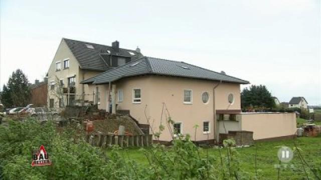 23. Eine Familie lebt in einem Rohbau ohne Sanitäranlagen