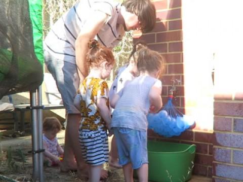 Trampoline Surprise: 1000 Water Balloons!