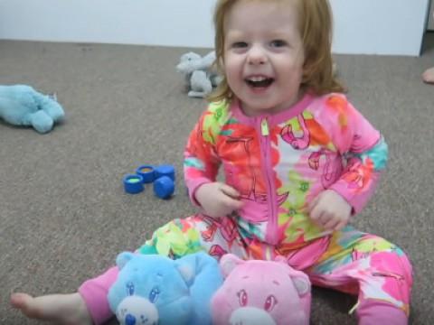 Pearl Reacts to Care Bear Slippers!