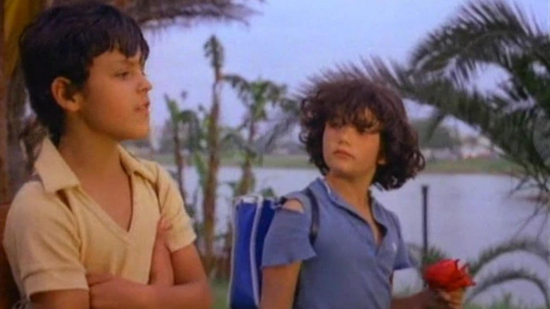 The Girl with the Blue Backpack