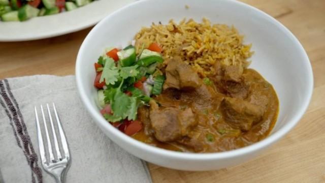 Goat Curry with Rice Pilaf and Carmelized Onions