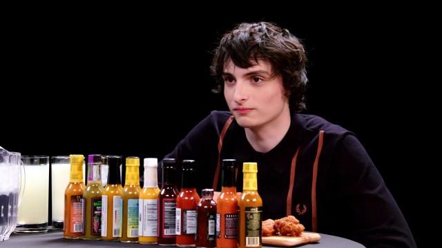 Finn Wolfhard Embraces Insanity While Eating Spicy Wings