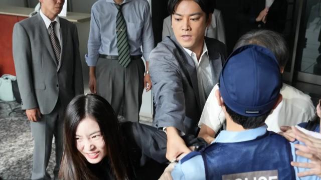 女の正体