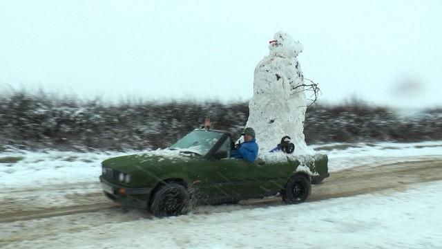 We Built a Snowman on the car and went for drive haha.