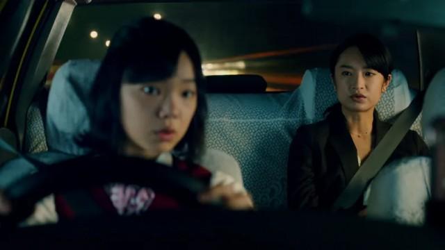 タクシーの女
