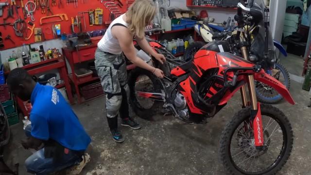Fixing up my bike to continue down Africa