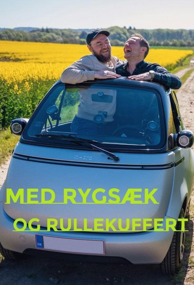 Med rygsaek og rullekuffert