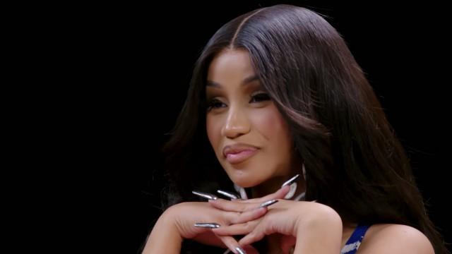 Cardi B Tries Not to Panic While Eating Spicy Wings