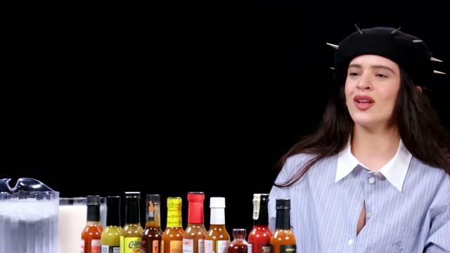 Rosalía Can't Stop Laughing While Eating Spicy Wings
